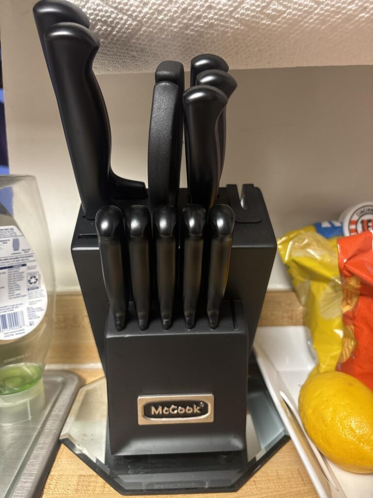 Close-up of McCook chef knife blade and ergonomic